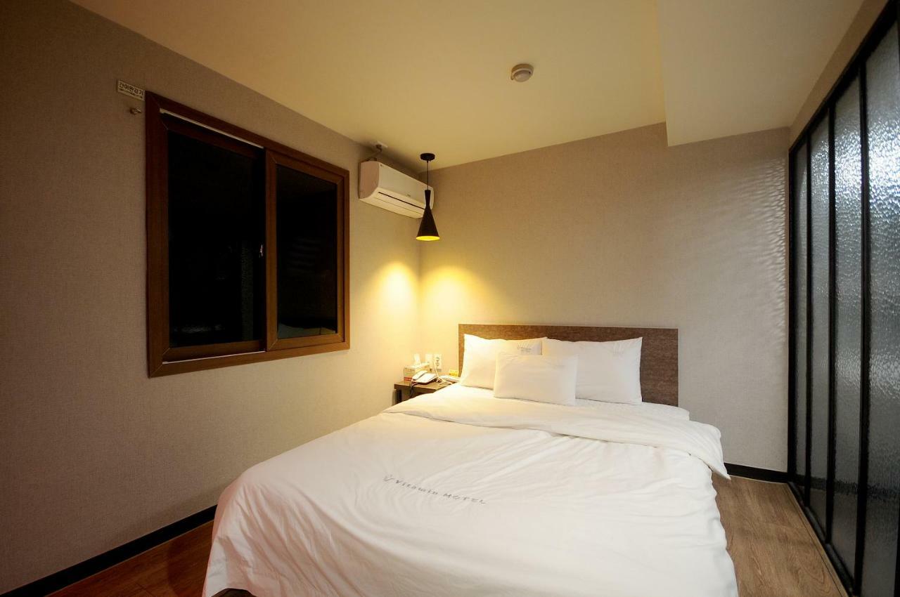 Vitamin Hotel Busan Bagian luar foto